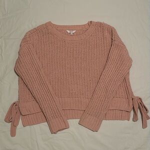 Candie’s cropped pink knit sweater